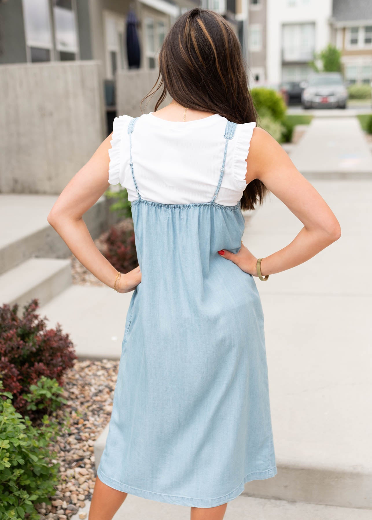 View of the straps on the denim-like strap dress