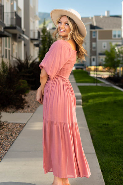 Side view of a dusty rose dress