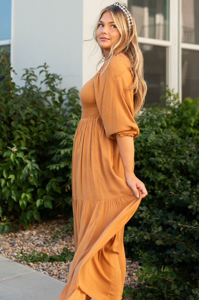Side view of a light brown dress