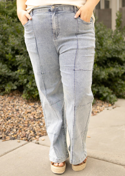 Plus size light denim jeans with patchwork pattern
