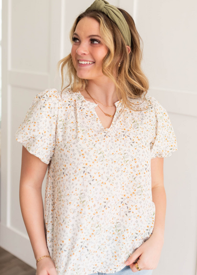 Cream floral printed blouse with short sleeves