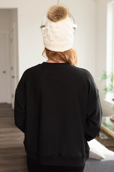 Back view of the jolly rhinestone crewneck