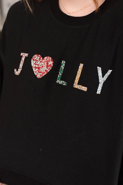 Clouse up of the rhinestones on the Jolly rhinestone crewneck