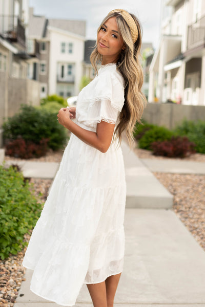 Side view of a white floral dress