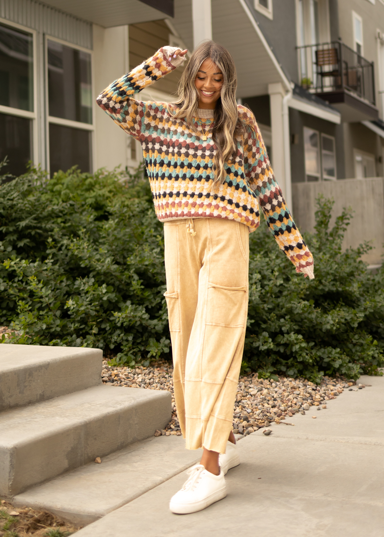 Long sleeve multi sweater with camel pants that are sold separately