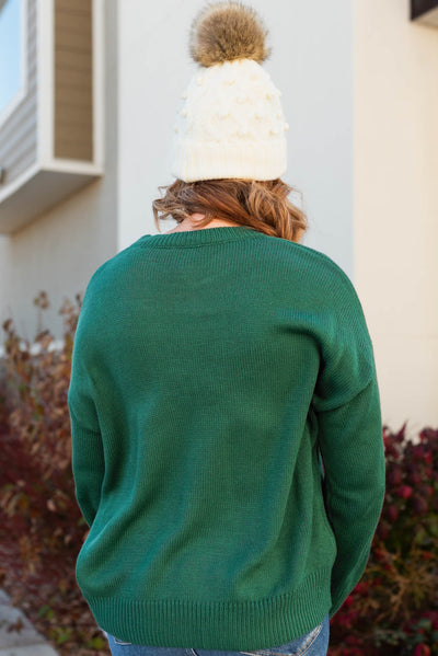 Back view of a the joy hunter green sweater