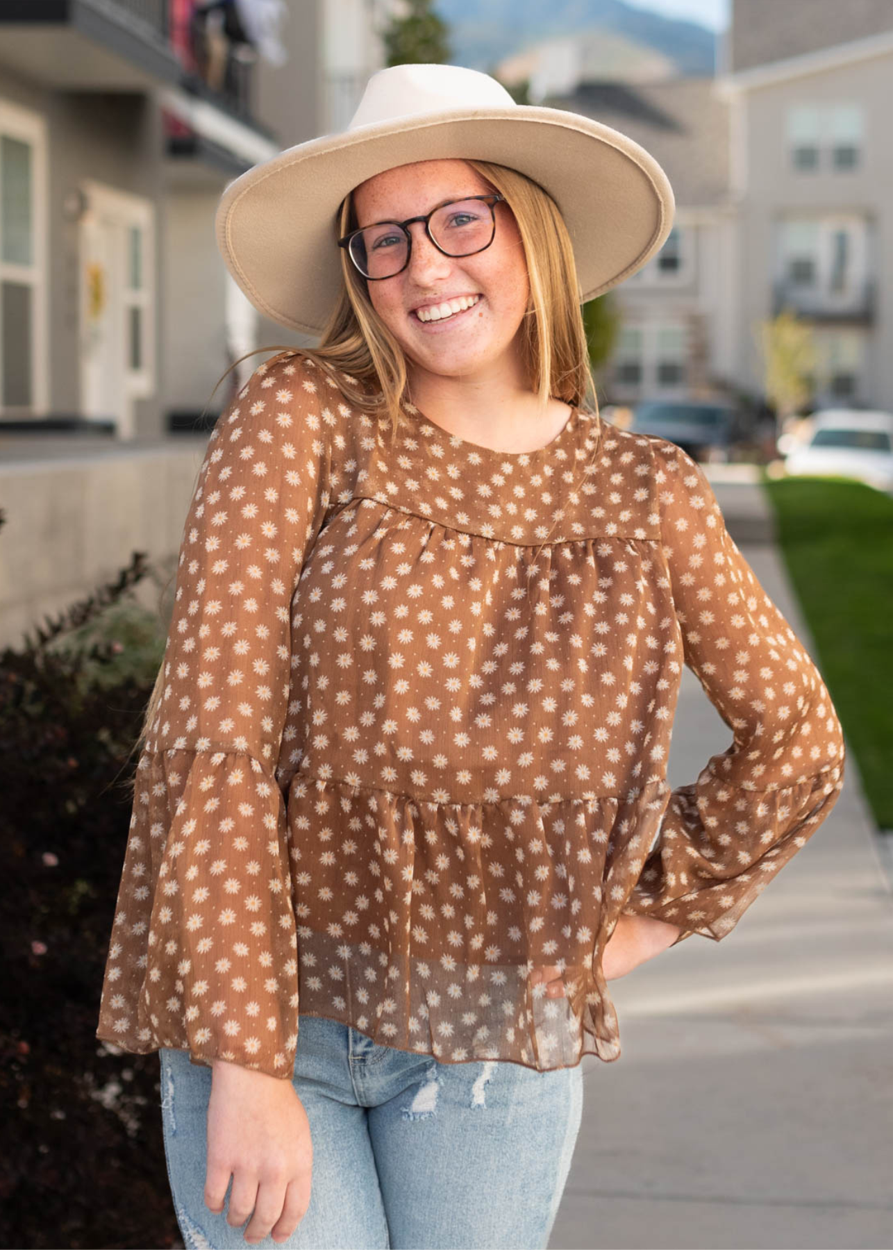 Long sleeve brown floral top with tiered bodice