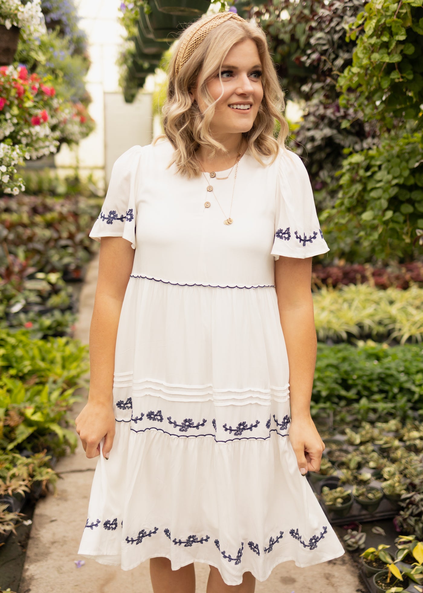 Below the knee white dress with blue embroidery