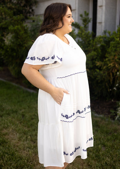 Short sleeve white embroidery with a v-neck