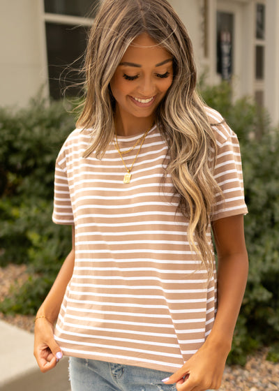 Side view of a taupe top with white stripes