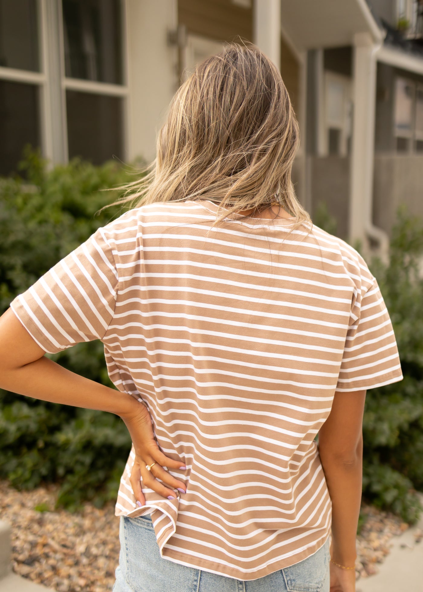 Back view of a taupe top