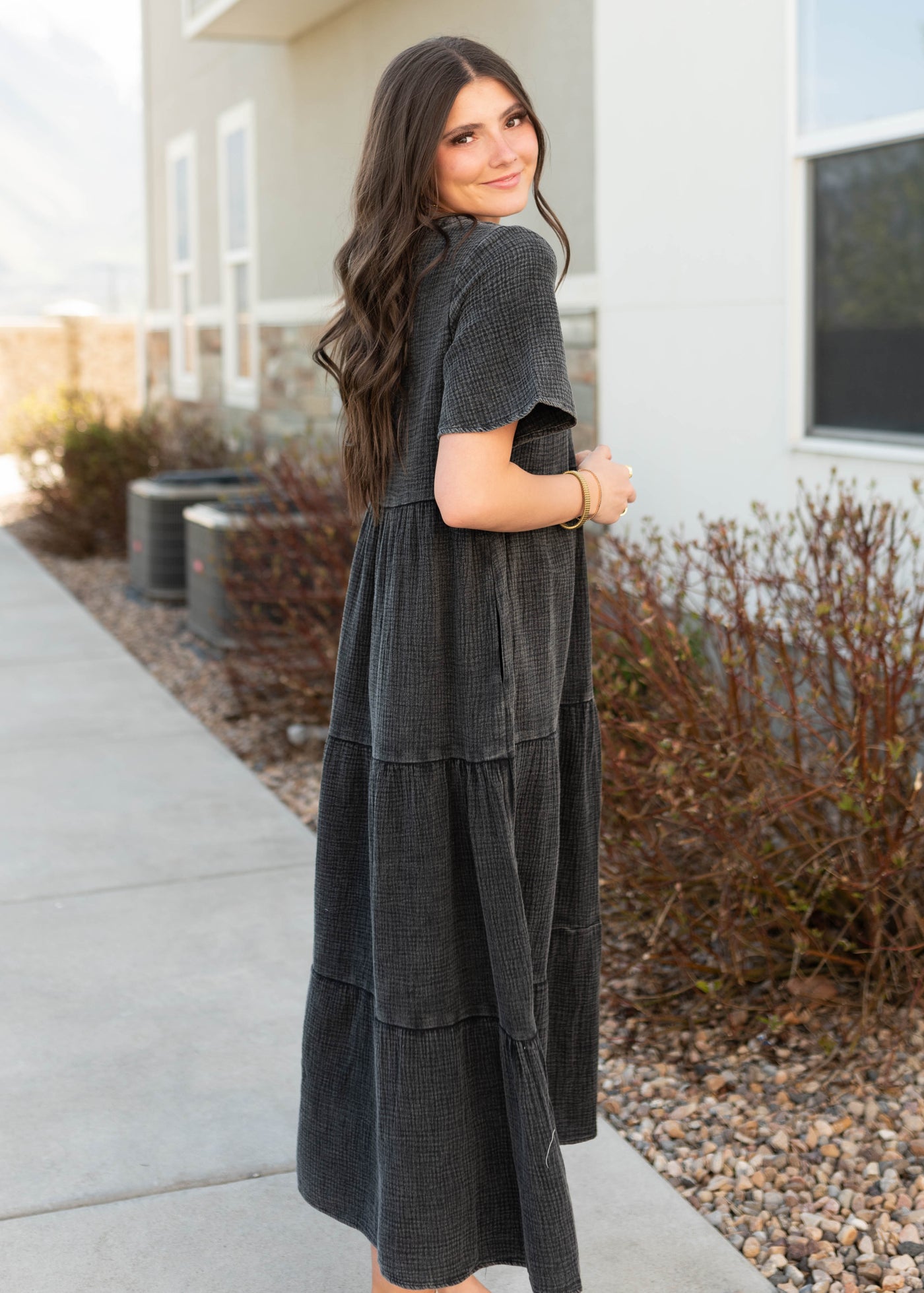Side view of the black cotton dress