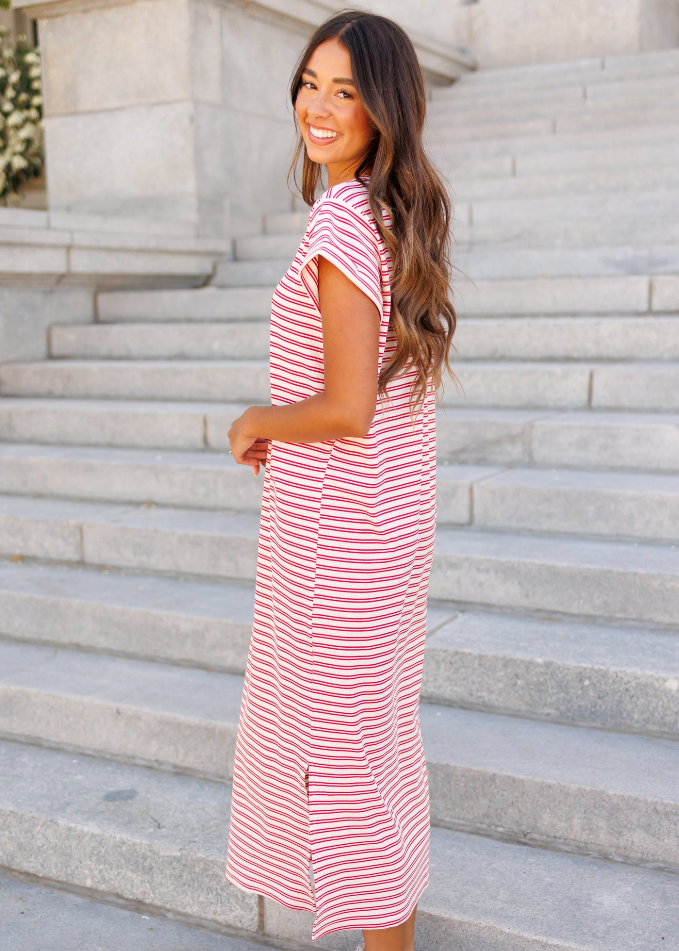 Side view of the red striped t-shirt dress