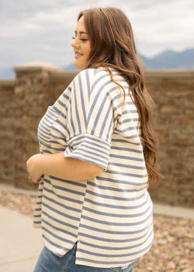 Side view of a plus size denim top
