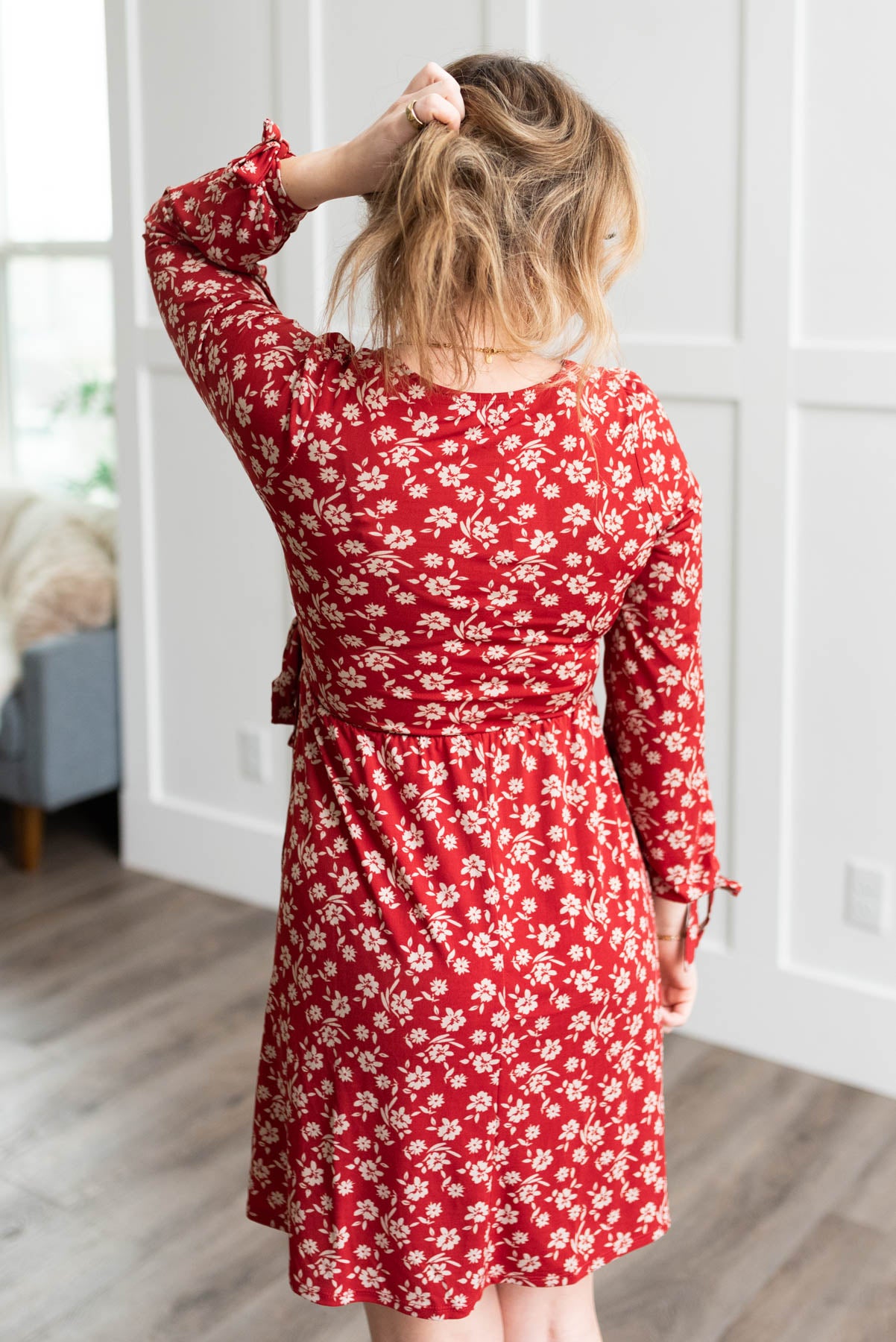Back view of a red floral dress