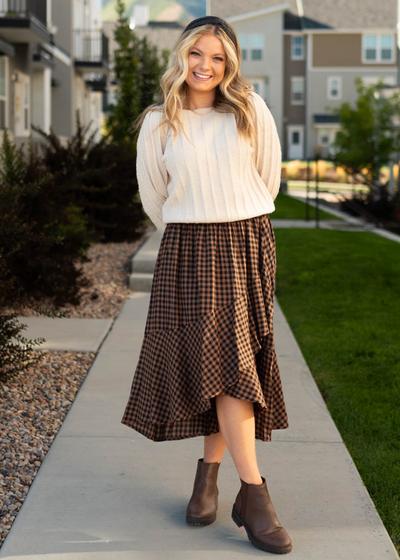 Mocha plaid skirt with a black plaid pattern