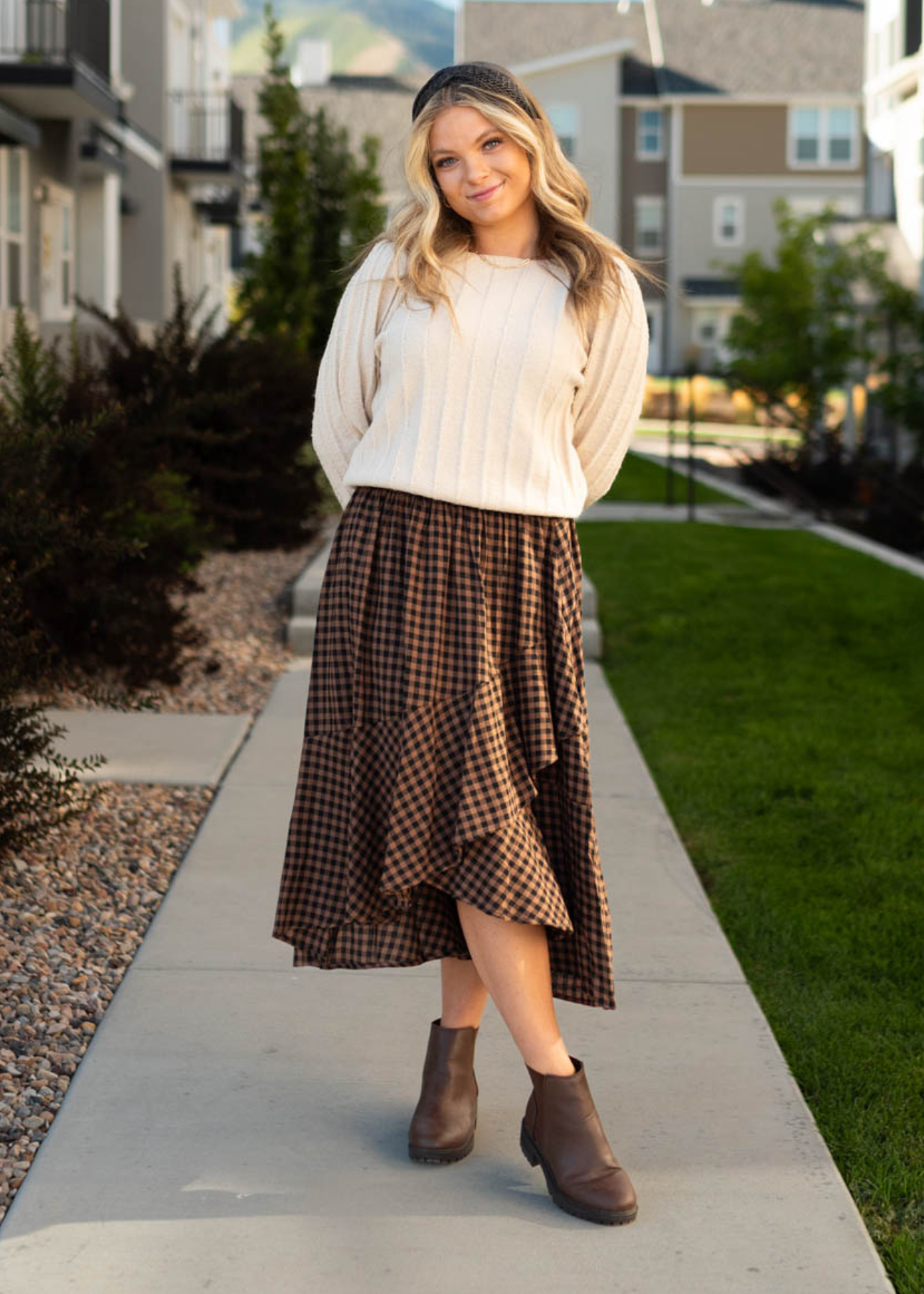 Mocha plaid skirt with a wide ruffle at them hem