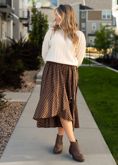 Front view of a mocha plaid skirt