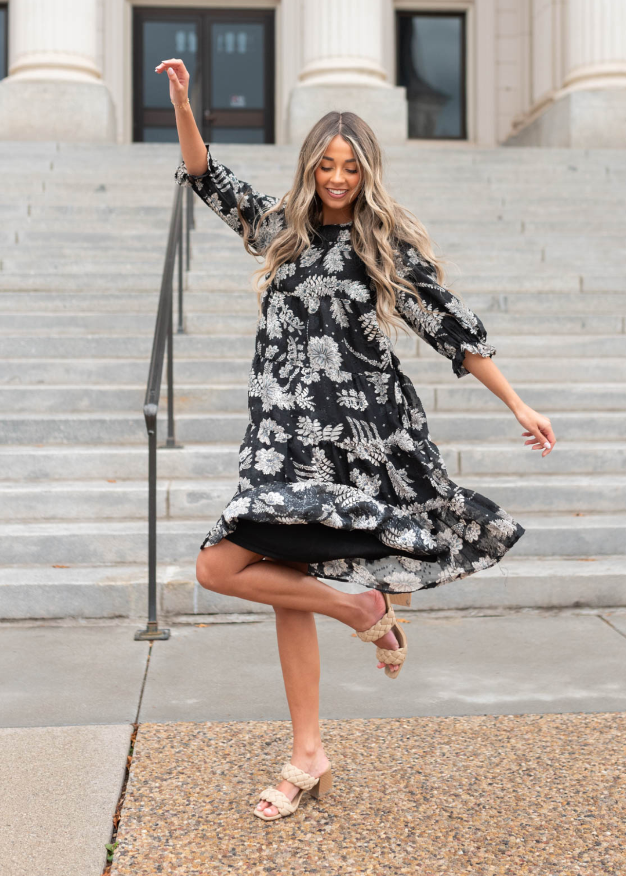 Knee length black floral dress with white flowers