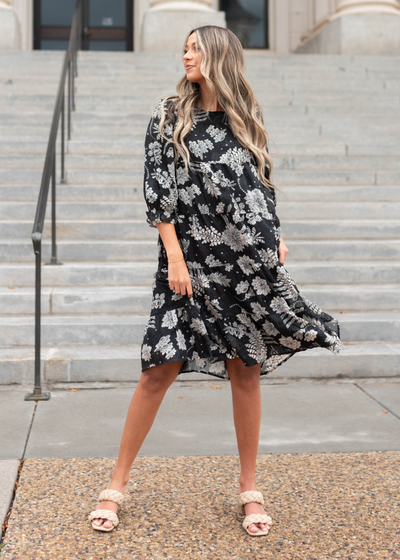 Three quarter sleeve black floral dress