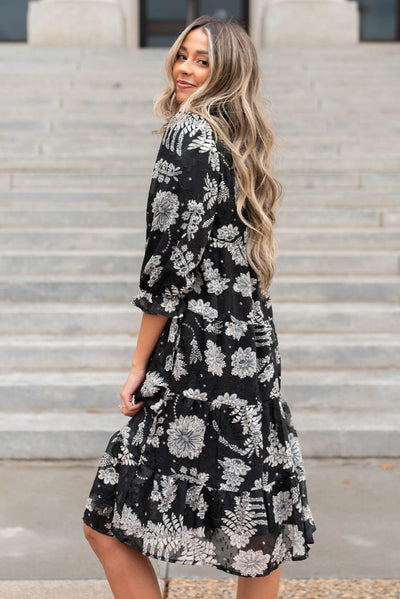 Side view of a black floral dress