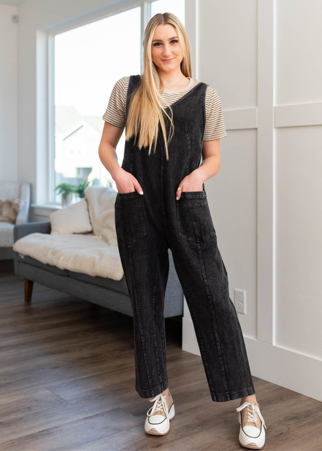 Black denim overalls with front pockets