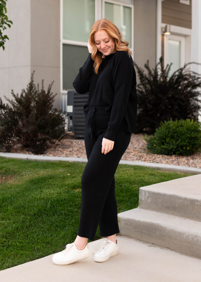 Black sweater with long sleeves