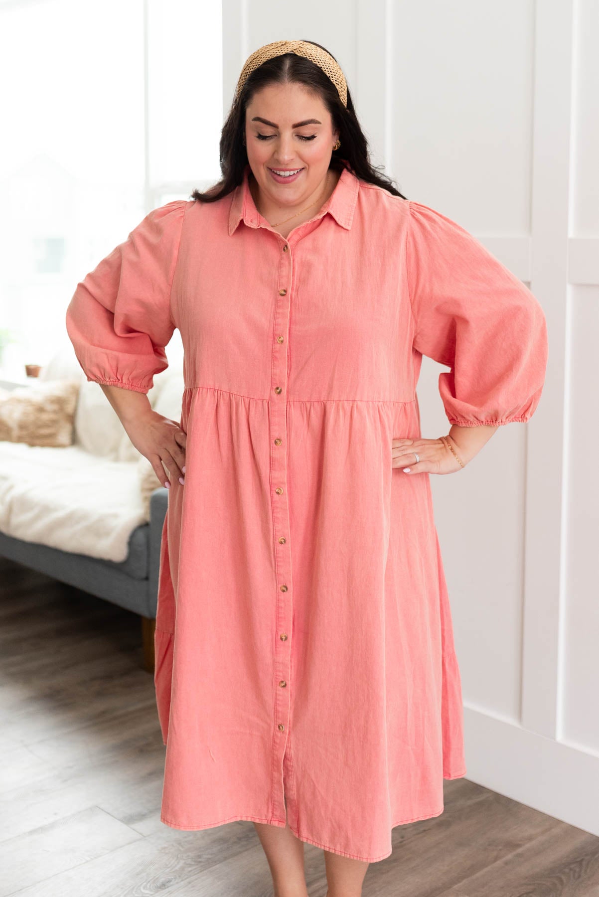 Plus size pink button down dress with high waistline 