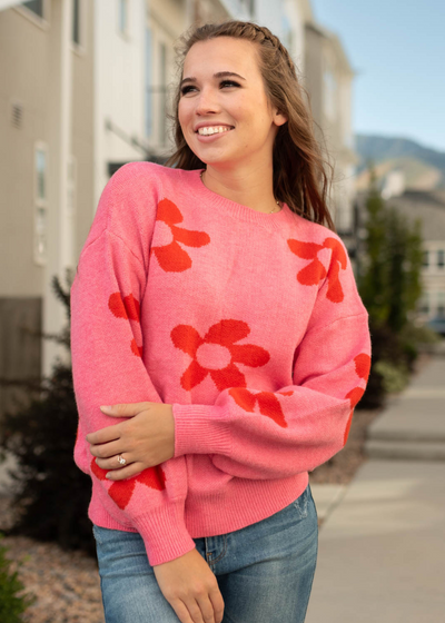 Pink floral sweater with long sleeves