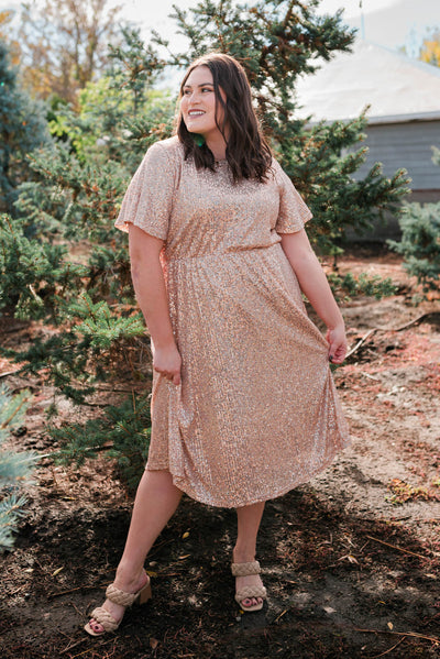 Plus size rose gold sequin dress with short sleeves