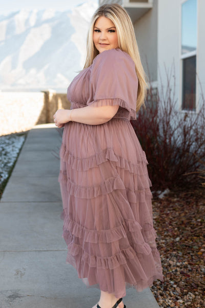 Side view of a dusty lavender maxi dress with short sleeves