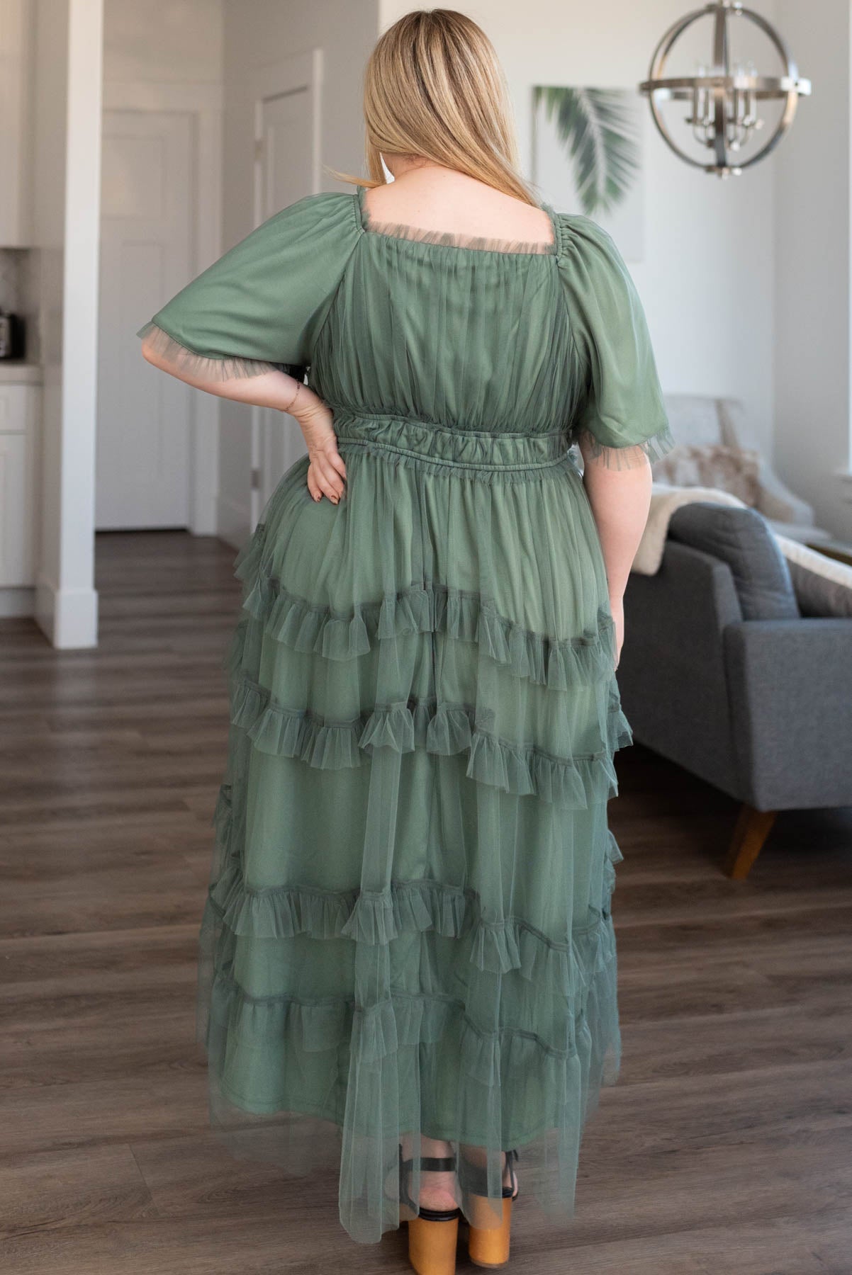 Back view of a plus size dusty teal maxi dress