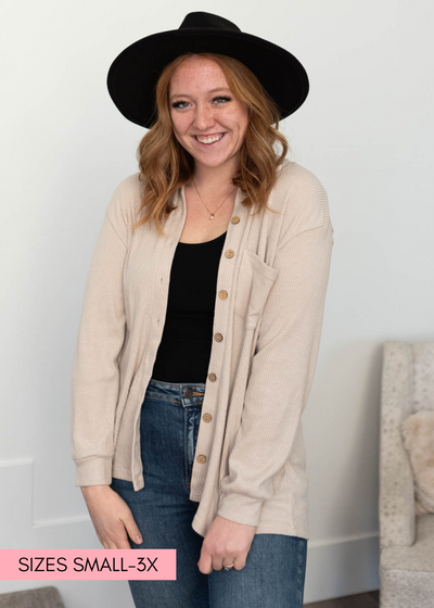 Button up taupe top with long sleeves and a pocket