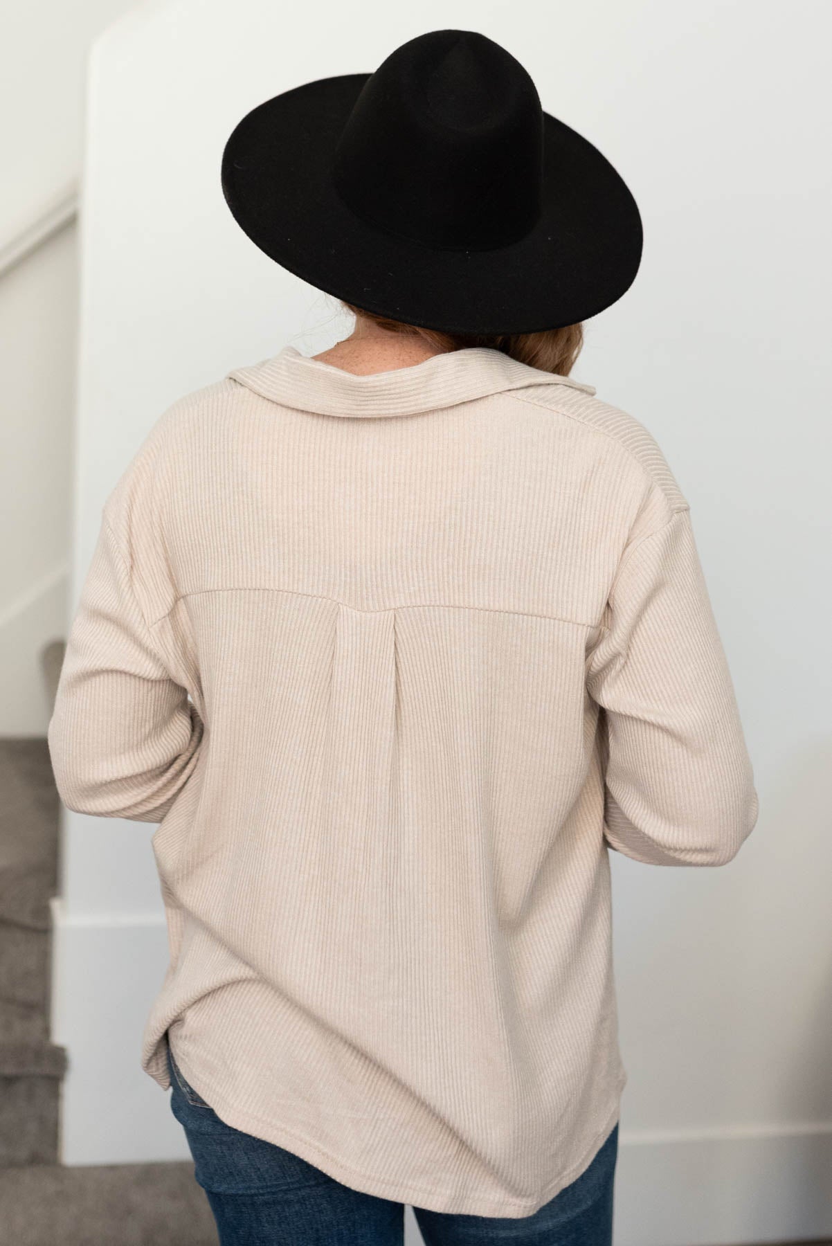 Back view of a taupe top