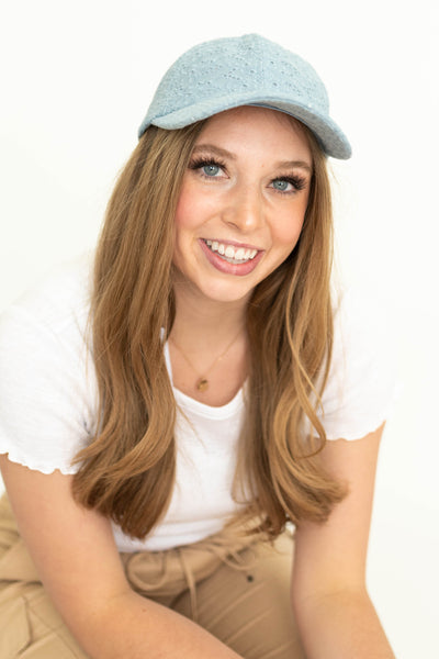 Blue baseball cap with eyelet pattern