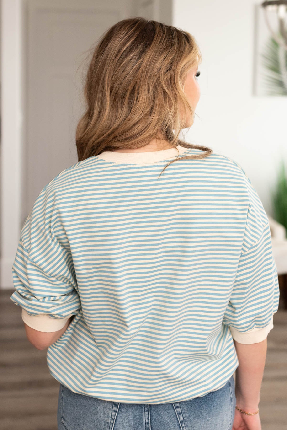 Back view of the blue stripe top