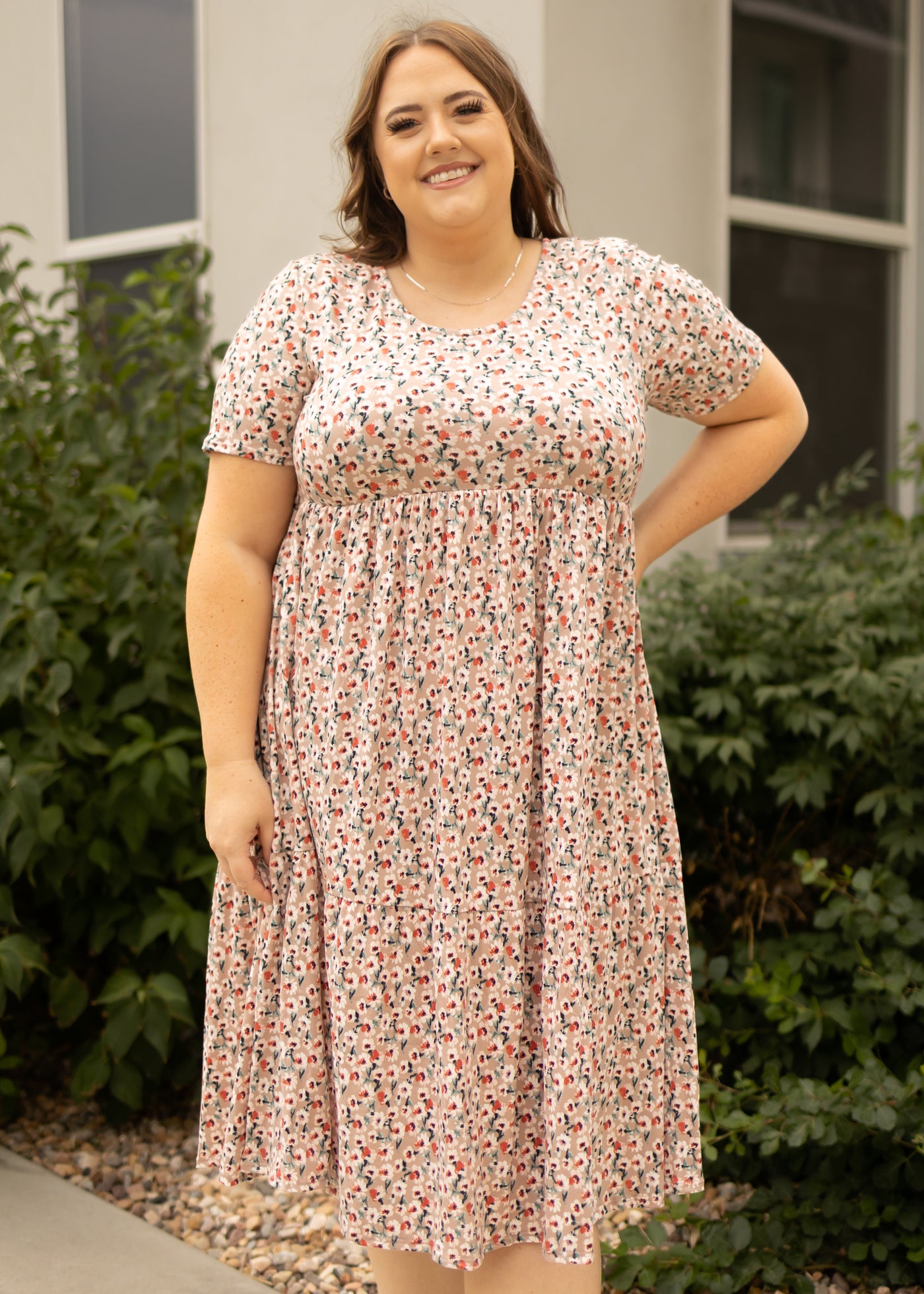 Plus size mocha floral dress with a high waist and short sleeves
