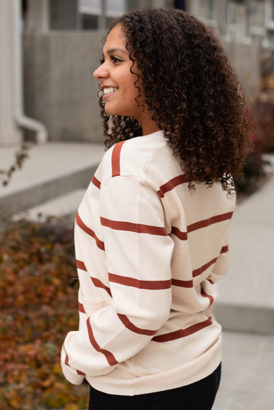 Side view of the oat stripe cardigan