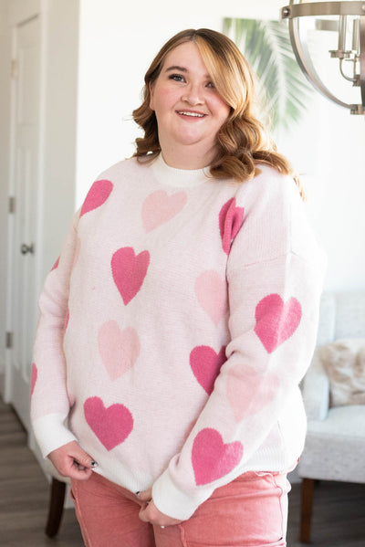 Plus size pink heart sweater with long sleeves