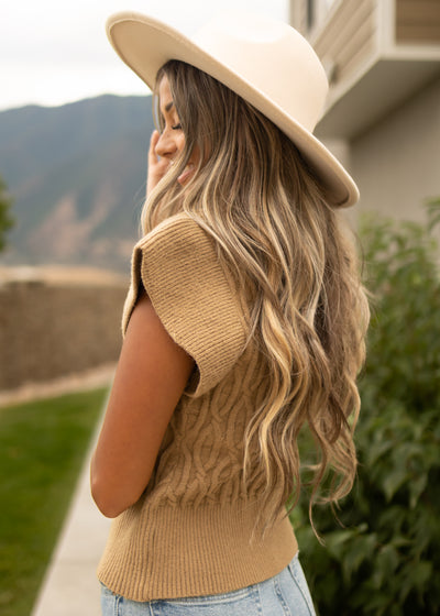 Side view of a mocha sweater