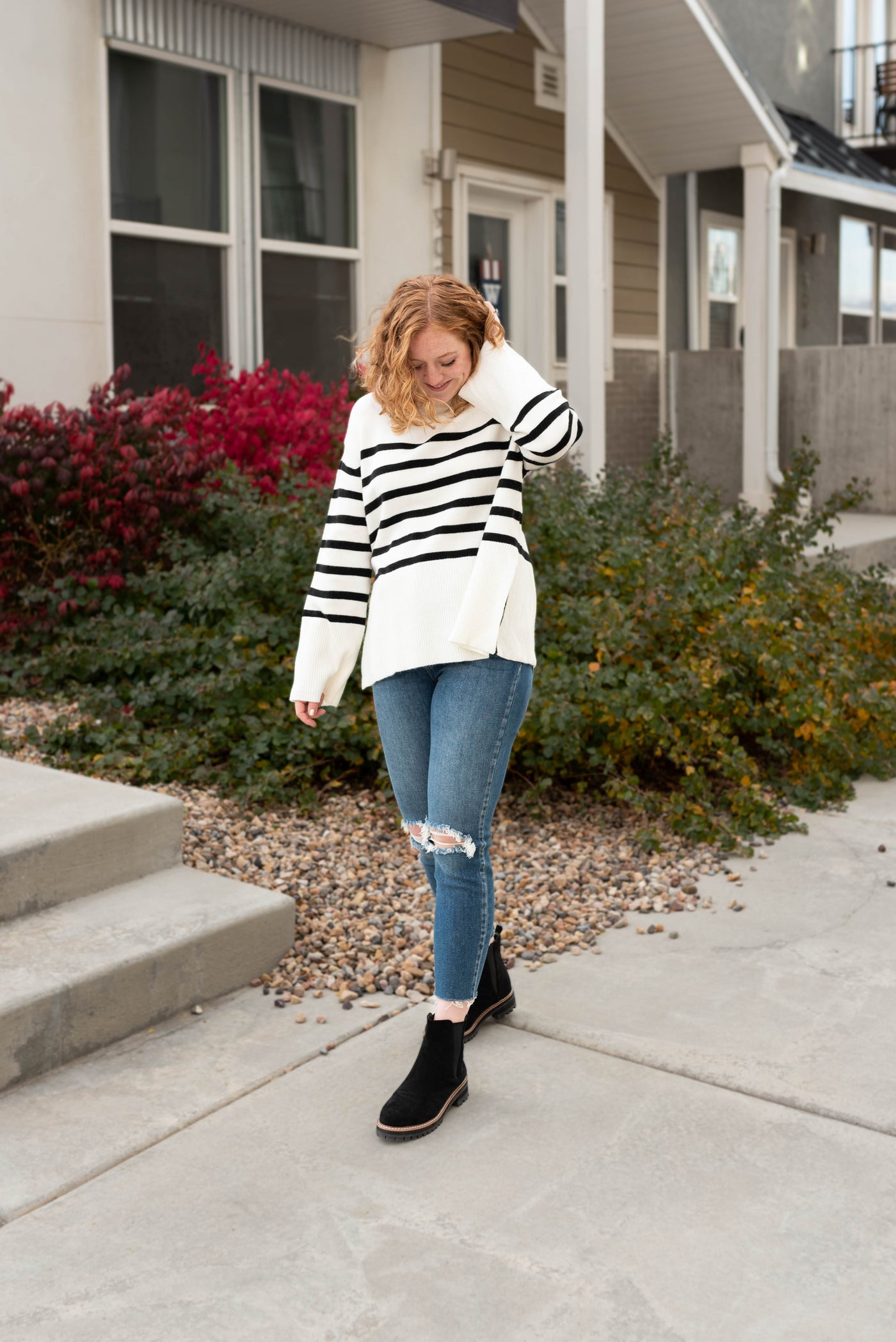 Ivory striped sweater with black stripes