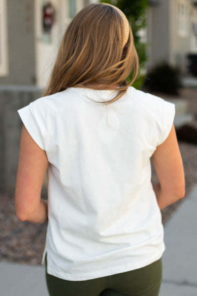 Back view of a white top with crop sleeves