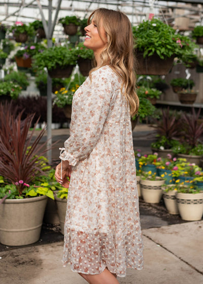 Side view of the cream floral dot dress