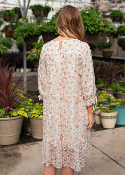 Back view of the cream floral dot dress