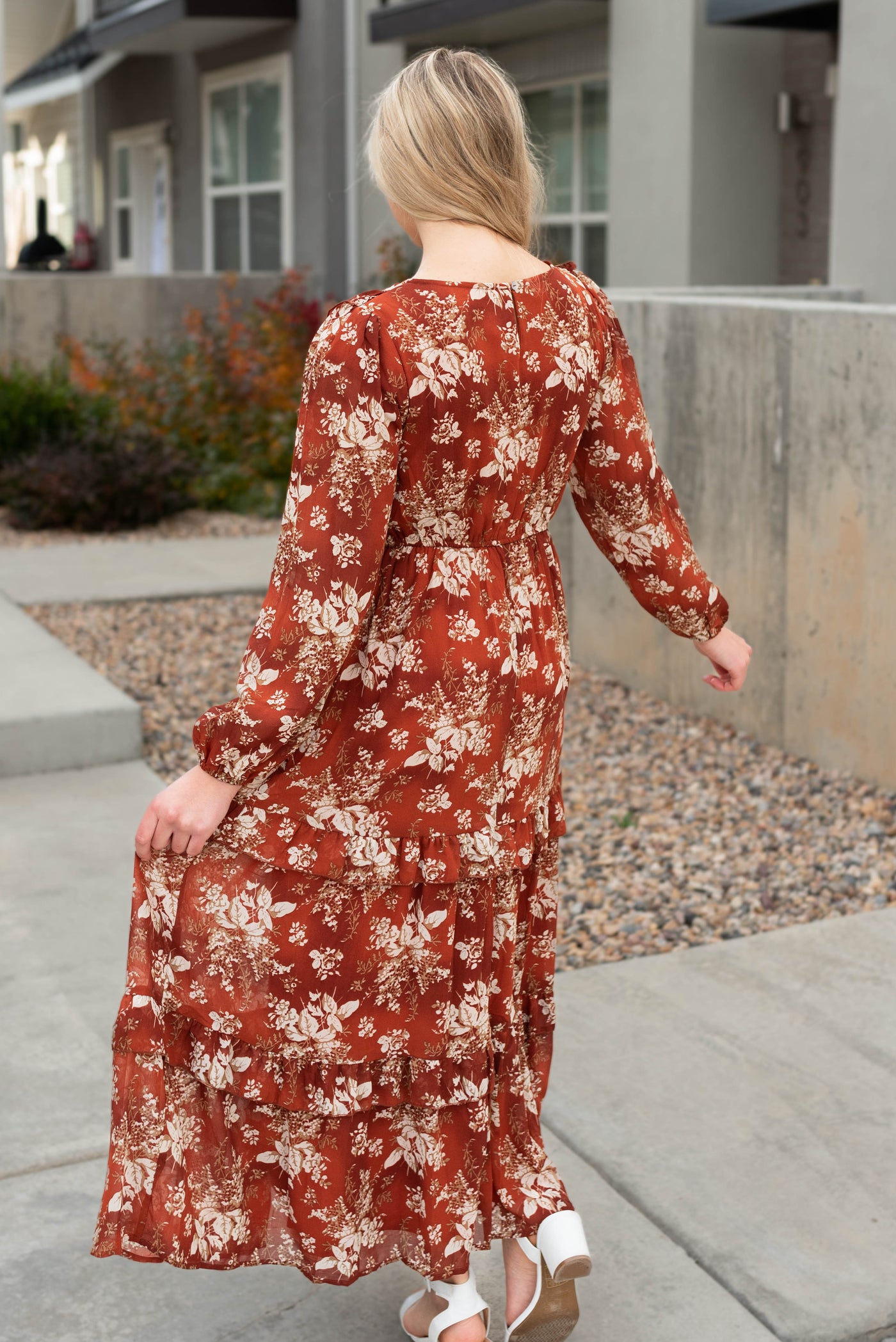 Back view of the rust floral maxi dress