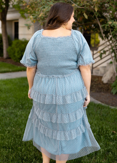 Back view of a plus size short sleeve dusty blue dress