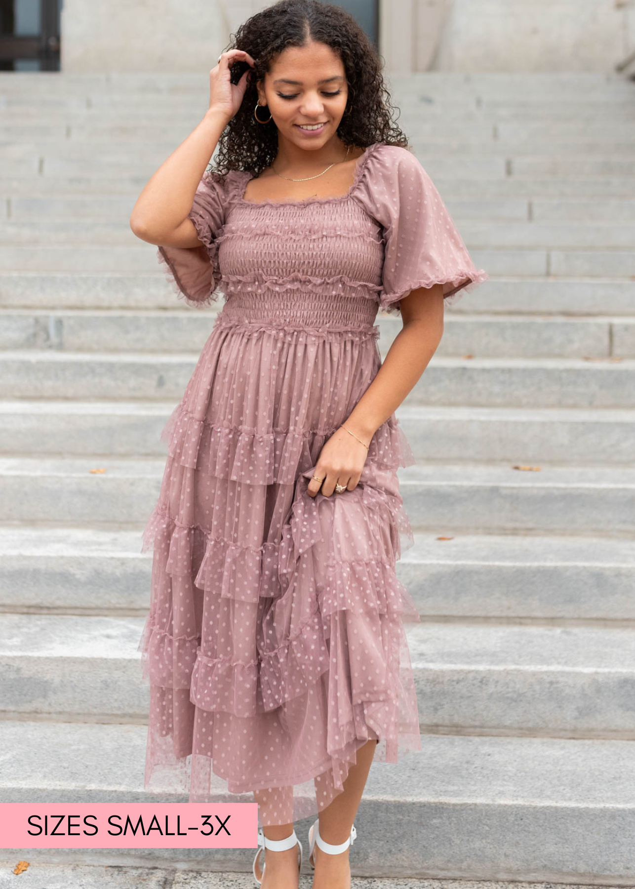 Dusty rose dress with ruffles on skirt and bodice