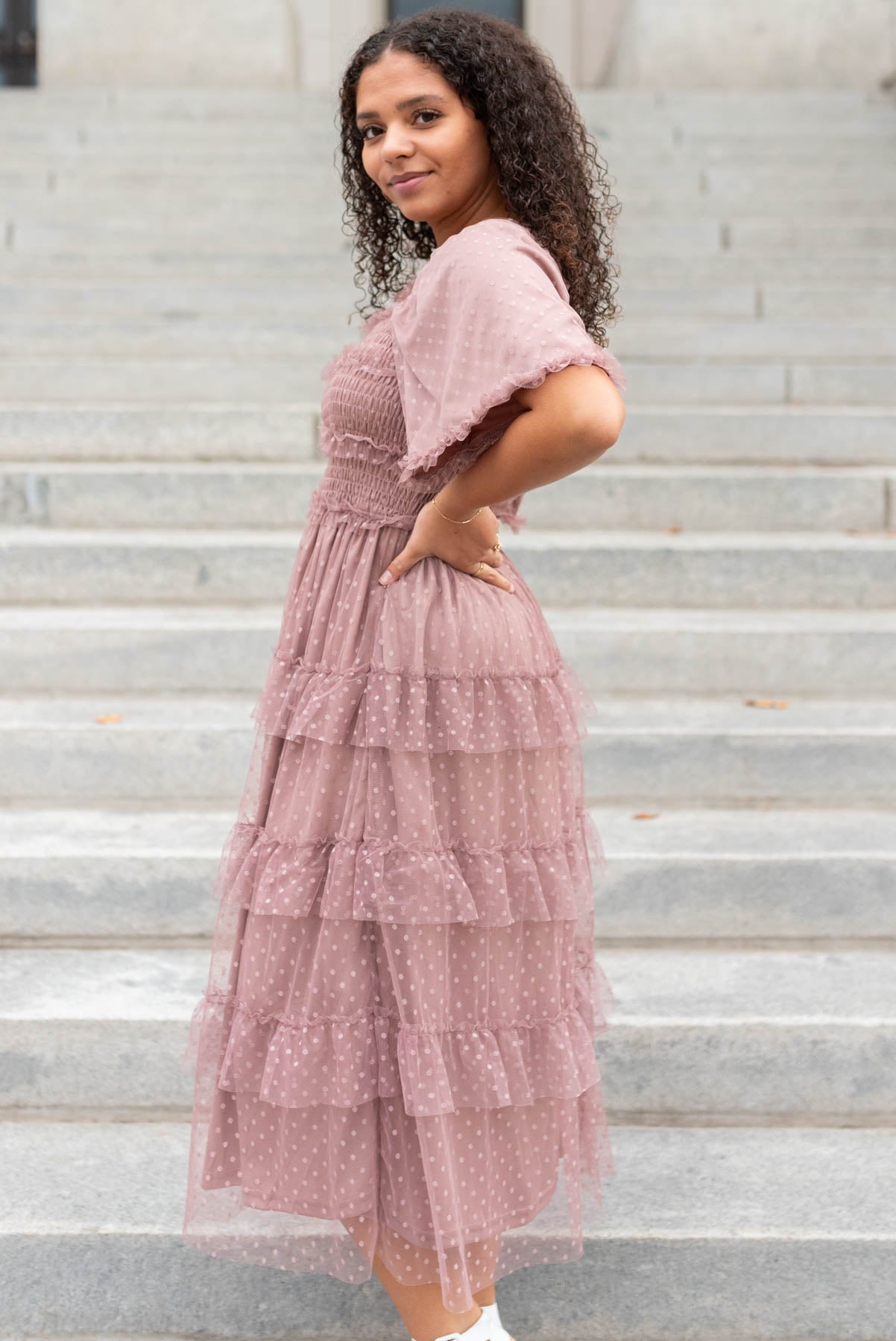 Side view of a dusty rose dress
