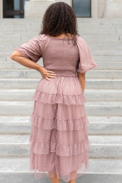 Back view of a dusty rose dress