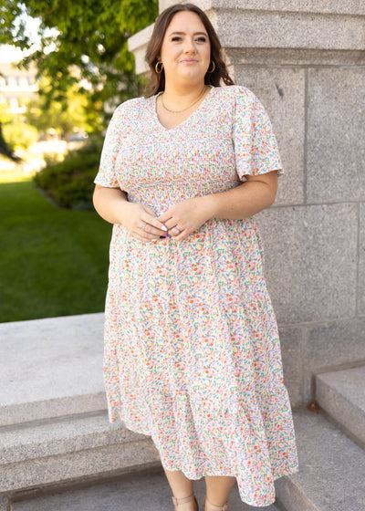 Plus size coral floral dress with v-neck